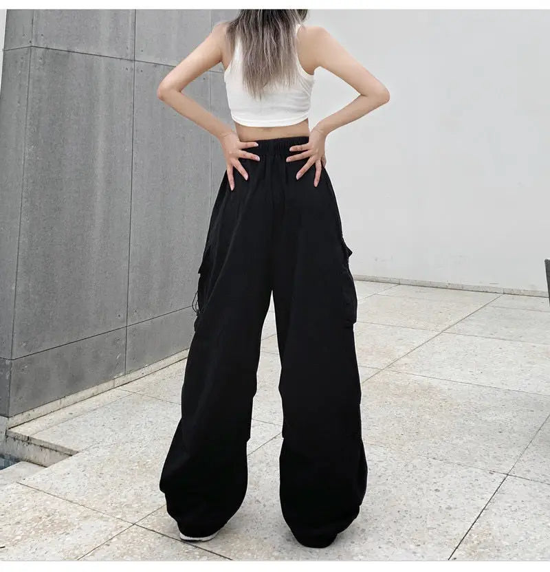 Pantaloni tehnici damă cu talie joasă, croială largă și șnur, stil Y2K streetwear – joggeri oversize, casual și comozi